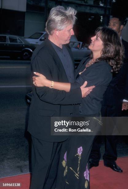 Actor Gary Busey and wife Tiani Warden attend the Screening of the TNT Original Movie "Rough Riders" on July 17, 1997 at the Academy Theatre in...