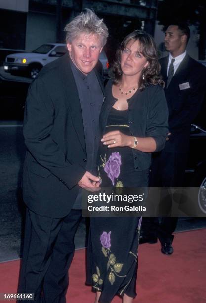 Actor Gary Busey and wife Tiani Warden attend the Screening of the TNT Original Movie "Rough Riders" on July 17, 1997 at the Academy Theatre in...