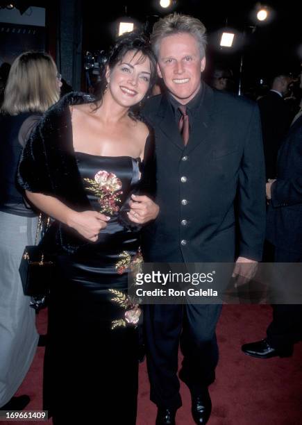 Actor Gary Busey and wife Tiani Warden attend the "Soldier" Hollywood Premiere on October 21, 1998 at the Mann's Chinese Theatre in Hollywood,...