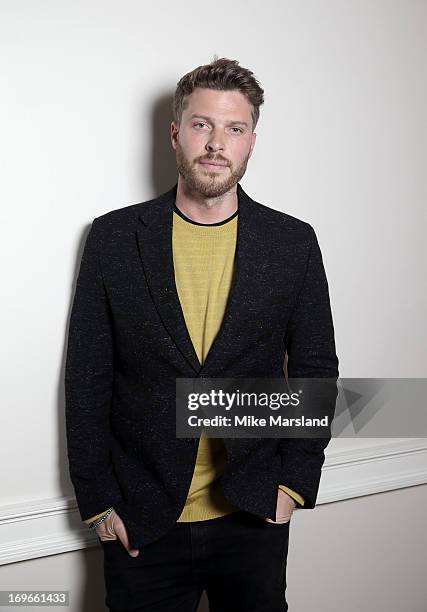 Rick Edwards poses for Stella/Esquire Portrait Studio at Somerset House on May 29, 2013 in London, England.