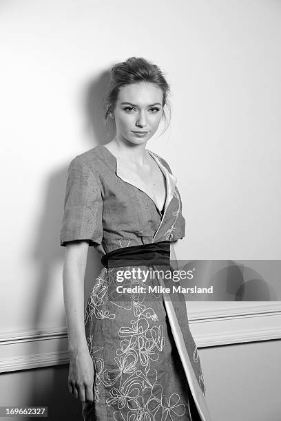 Eleanor Tomlinson poses for Stella/Esquire Portrait Studio at Somerset House on May 29, 2013 in London, England.