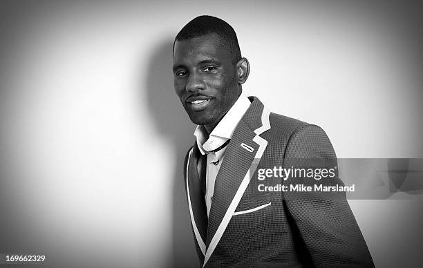 Wretch 32 poses for Stella/Esquire Portrait Studio at Somerset House on May 29, 2013 in London, England.