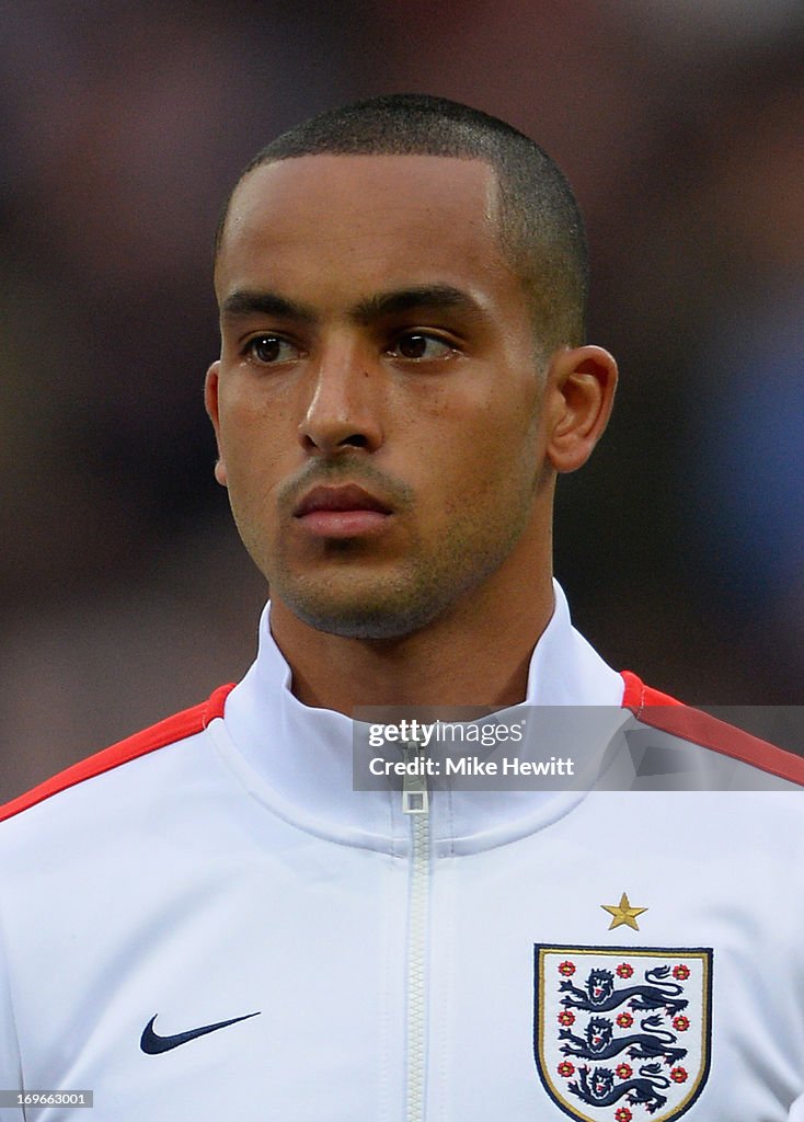 Theo Walcott of England looks on prior to the International Friendly