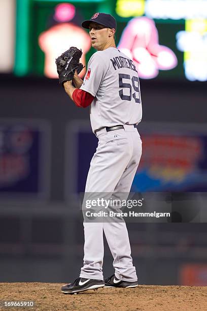 Clayton Mortensen of the Boston Red Sox pitches against the Minnesota Twins on May 18, 2013 at Target Field in Minneapolis, Minnesota. The Red Sox...