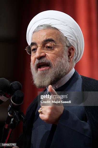 Iran's former nuclear negotiator and presidential candidate, Hassan Rouhani, speaks to his supporters during a campaign rally on May 30, 2013 in...