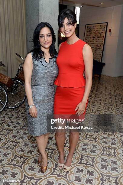 Actresses Archie Panjabi and Morena Baccarin attend the Variety Emmy Studio at Palihouse on May 30, 2013 in West Hollywood, California.