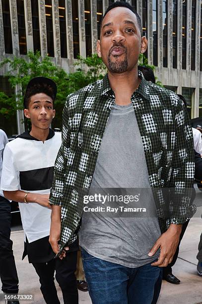 Actors Jaden Smith and Will Smith enter the Sirius XM Studios on May 30, 2013 in New York City.