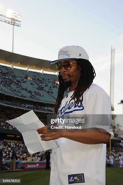 In this handout photo provided by the Los Angeles Dodgers, Lil Jon, rapper, record producer, entrepreneur and international DJ who was a member of...