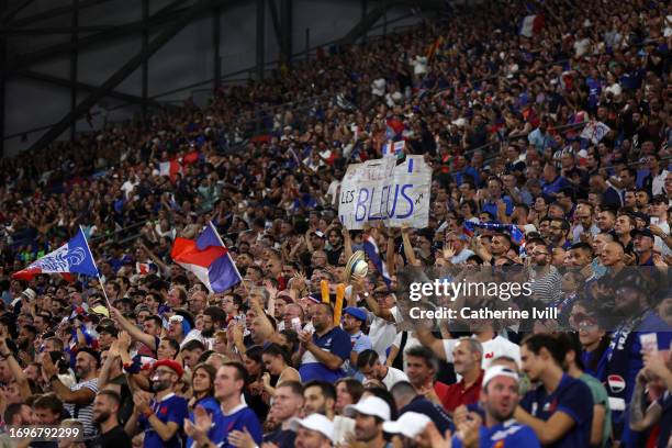 Fans of France hold up signs saying ' Allez Les Bleus during the Rugby World Cup France 2023 match between France and Namibia at Stade Velodrome on...