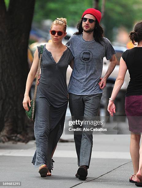 Sienna Miller and Tom Sturridge are seen in the West Village on May 30, 2013 in New York City.