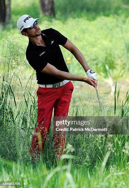 Scott Harrington chips out of the rough onto the green on the sixth hole during Round One of the Web.com Tour Mid-Atlantic Championship on May 30,...