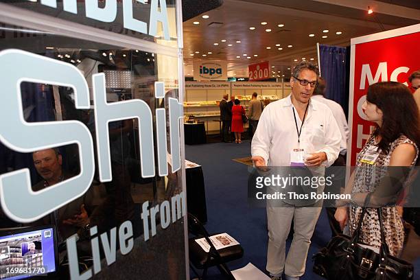 Steve Gottlieb, founder & CEO, Shindig speaks with guest at Shindig Hosts Live Video Chats with over Fifty Authors at BookExpo America 2013 at Jacob...