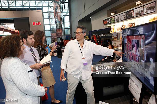 Steve Gottlieb, founder & CEO, Shindig speaks with guests at Shindig Hosts Live Video Chats with over Fifty Authors at BookExpo America 2013 at Jacob...