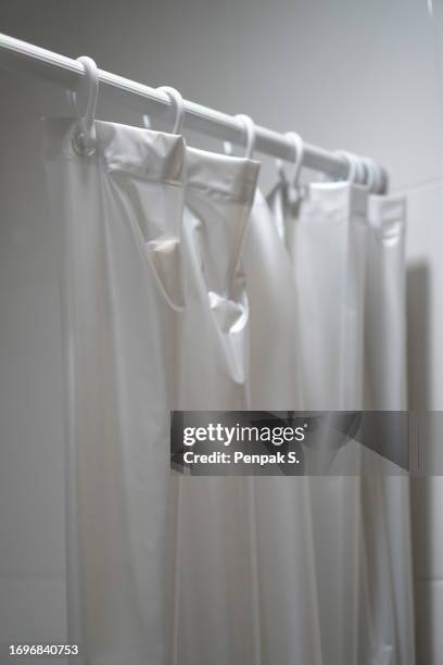 plastic curtains and curtain rails in the bathroom - shower curtain stock pictures, royalty-free photos & images