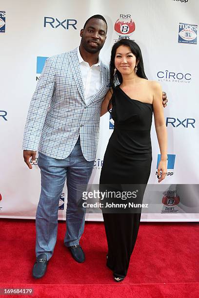 Giants Justin Tuck and professional pool player Jeanette "Black Widow" Lee attend the NY Giants Justin Tuck's 5th Annual Celebrity Billiards...