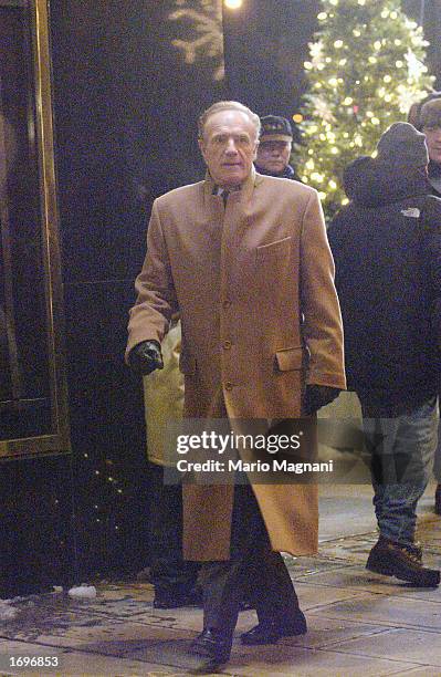 James Caan walks on the set of the movie "Elf" during a break in filming December 16, 2002 in New York City.