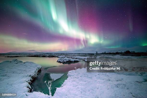 the colors of aurora - nationaal park pingvellir stockfoto's en -beelden