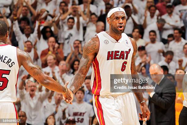 LeBron James of the Miami Heat celebrates while playing the Indiana Pacers in Game Five of the Eastern Conference Finals during the 2013 NBA Playoffs...