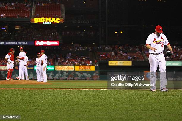 Reliever Mitchell Boggs of the St. Louis Cardinals is pulled from the game after allowing a solo home run and a walk against the Kansas City Royals...