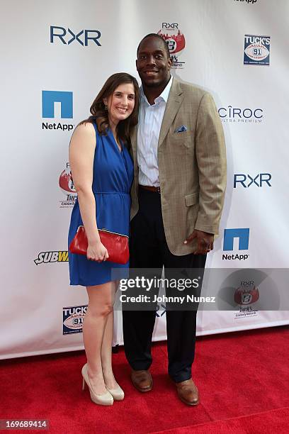 Giants Kevin Boothe and guest attend the NY Giants Justin Tuck's 5th Annual Celebrity Billiards Tournament on May 30, 2013 in New York City.