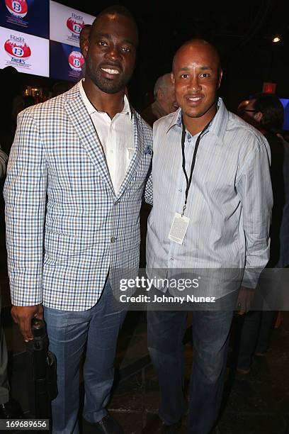 Giants Justin Tucks and NBA legend John Starks attend the NY Giants Justin Tuck's 5th Annual Celebrity Billiards Tournament on May 30, 2013 in New...