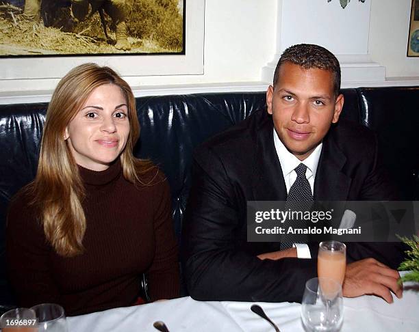All-Star shortstop Alex Rodriguez of the Texas Rangers has lunch at Nello's Restaurant with his wife Cynthia December 18, 2002 in New York City. The...
