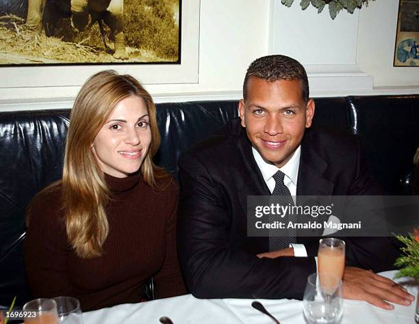 All-Star shortstop Alex Rodriguez of the Texas Rangers has lunch at Nello's Restaurant with his wife Cynthia December 18, 2002 in New York City. The...