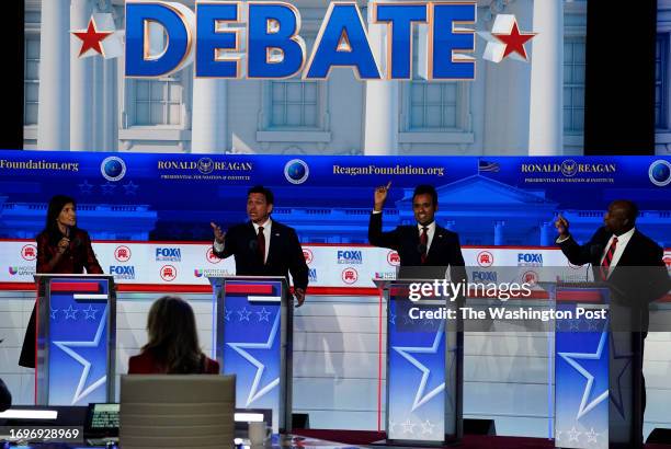 September 27: Former South Carolina governor Nikki Haley, left, and Sen. Tim Scott , far right, argue during the second Republican presidential...