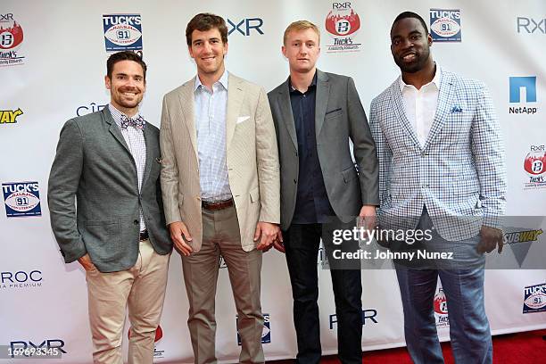 Red Bullls Heath Pearce, NY Giants Eli Manning, NY Red Bulls Ryan Meara and NY Giants Justin Tuck attend the NY Giants Justin Tuck's 5th Annual...