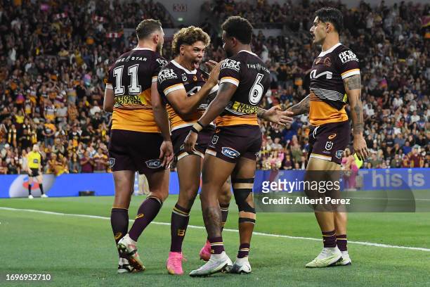 Reece Walsh of the Broncos celebrates after a Broncos try during the NRL Preliminary Final match between Brisbane Broncos and New Zealand Warriors at...