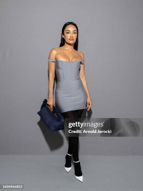 Amina Muaddi attends the Ferragamo fashion show during the Milan Fashion Week Womenswear Spring/Summer 2024 on September 23, 2023 in Milan, Italy.