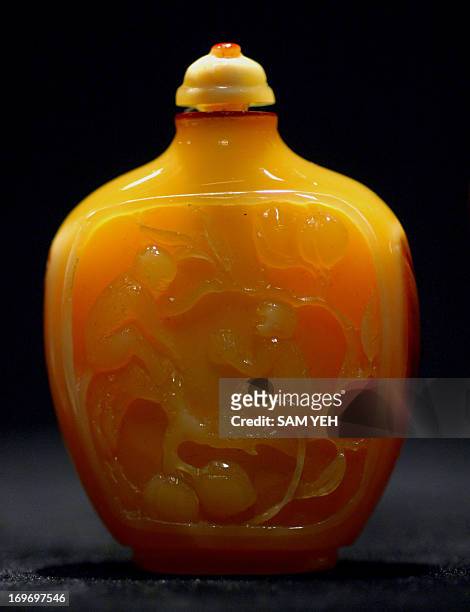 Hornbill snuff bottle is on display during an exhibition in Taipei on August 28, 2008. The snuff bottle was used to contain powdered tobacco and the...