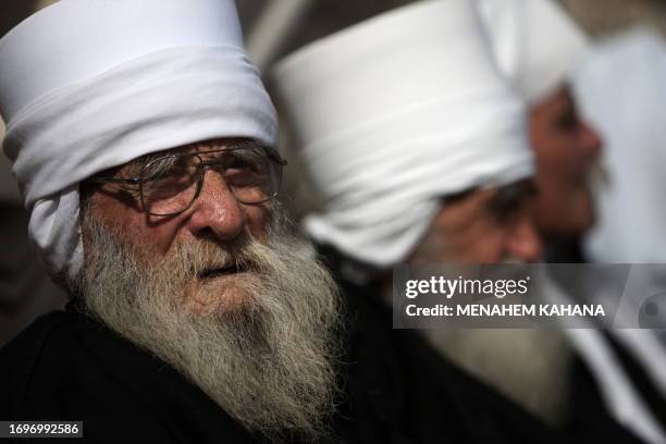 Druze residents of the Golan Heights attend a rally in the Druze village of Majdal Shams on February 14, 2010 in protest against the 1981 Israeli...