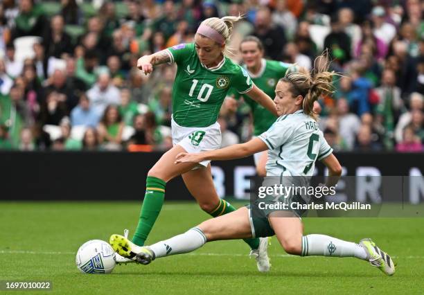 Denise O'Sullivan of Republic of Ireland is challenged by Simone Magill of Northern Ireland during the UEFA Women's Nations League match between...