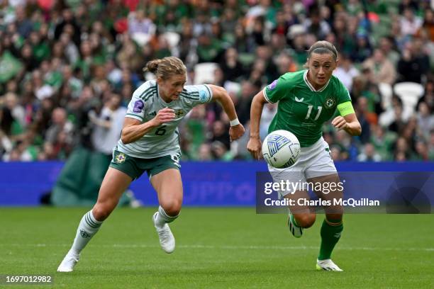 Katie McCabe of Republic of Ireland is challenged by Caragh Hamilton Milligan of Northern Ireland during the UEFA Women's Nations League match...