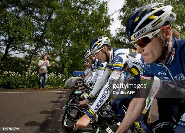 The Vacansoleil-DCM Procycling team pictured during a training at the Sports park Sloten in Amsterdam on May 31, 2013. AFP PHOTO / ANP - GUUS...