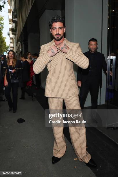 Michele Morrone arrives at the Dolce&Gabbana fashion show during the Milan Fashion Week Womenswear Spring/Summer 2024 on September 23, 2023 in Milan,...