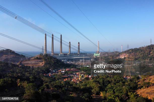 Smoke ash spews from the chimney of the coal power plant owned by Indonesian Power in Cilegon, Banten province, on September 28, 2023. Ash smoke from...