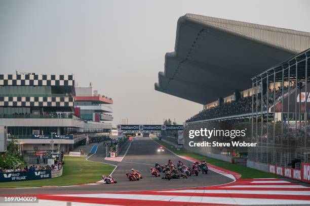 MotoGP riders Luca Marini of Italy and Mooney VR46 Racing Team, Pol Espargaro of Spain and Tech3 GASGAS Factory Racing and Stefan Bradl of Germany...