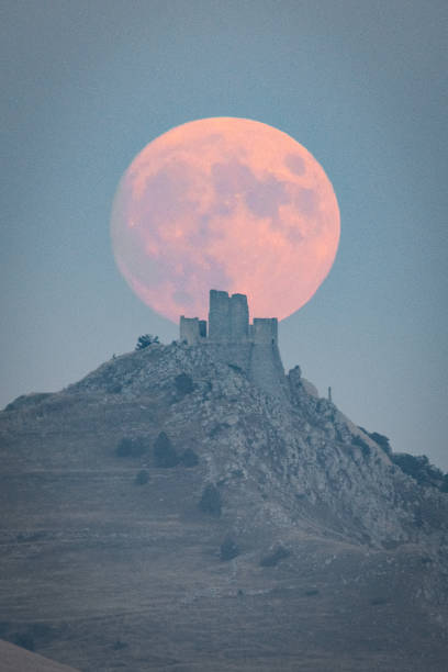 ITA: Harvest Full Moon Rises In Calascio, Italy