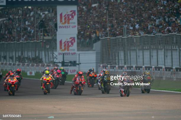 MotoGP riders at the start - Jorge Martin of Spain and Prima Pramac Racing leads the field during the Sprint of the MotoGP IndianOil Grand Prix of...