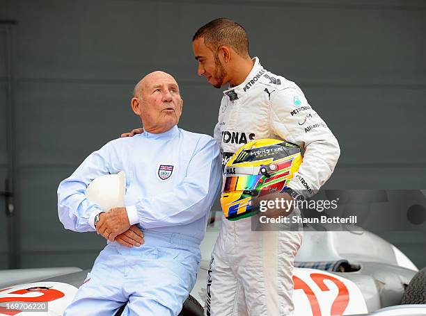 Sir Stirling Moss and Mercedes AMG Petronas F1 driver Lewis Hamilton meet at Silverstone Circuit on May 31, 2013 in Northampton, England.