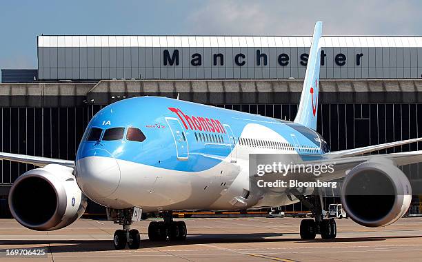 Boeing Co. 787 Dreamliner aircraft, operated by Thomson Airways, taxis on the runway after landing at Manchester Airport in Manchester, U.K., on...