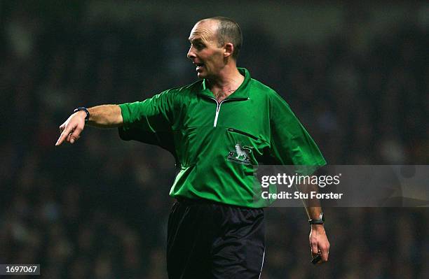 Referee Mike Dean pointing to the ground during the FA Barclaycard Premiership match between Aston Villa and West Bromwich Albion held on December...