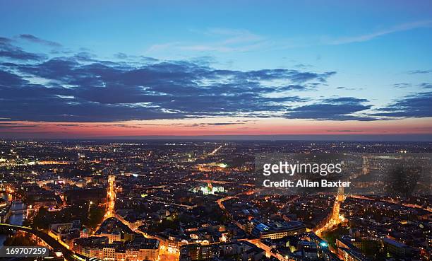 elevated view of berlin at twilight - urban skyline stock-fotos und bilder