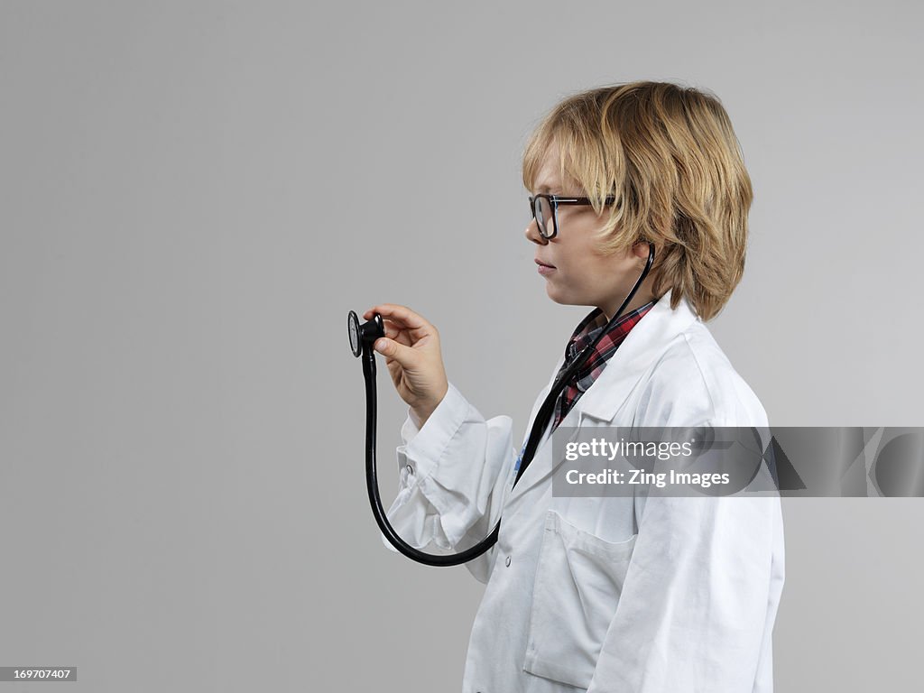 Boy dressed as doctor