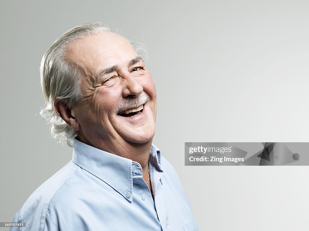 Senior man laughing