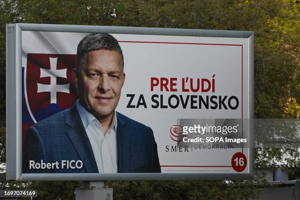 The election billboard of the Direction Social Democracy party displays the face of the leader of the party and former prime minister Robert Fico on...