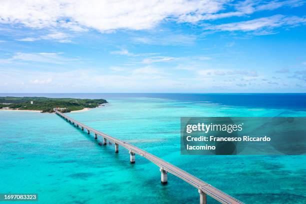 miyako island, okinawa. bridge over water - miyakojima stock pictures, royalty-free photos & images