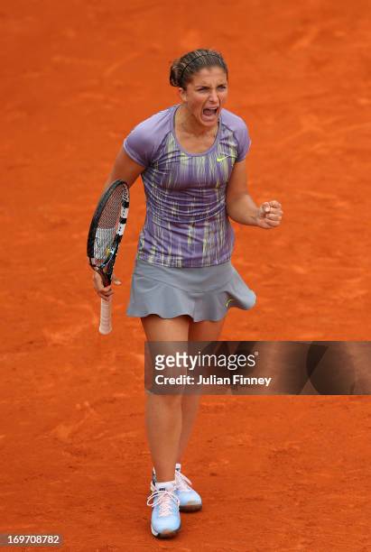 Sara Errani of Italy celebrates match point in her Women's Singles match against Sabine Lisicki of Germany during day six of the French Open at...